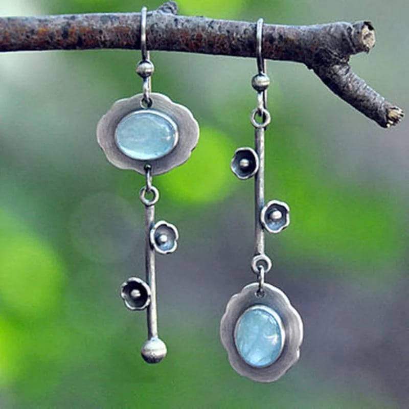 Boucle d’Oreilles Pierre de Lune de Style Bohème sur une branche en extérieur