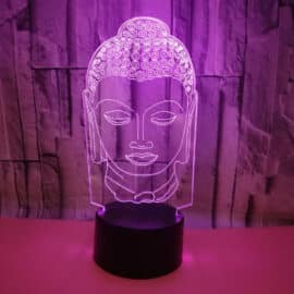 Lampe Bouddha LED à Couleurs Variables sur fond rose